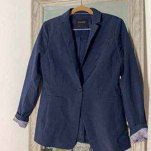 Once wore, navy blue blazer, like new.